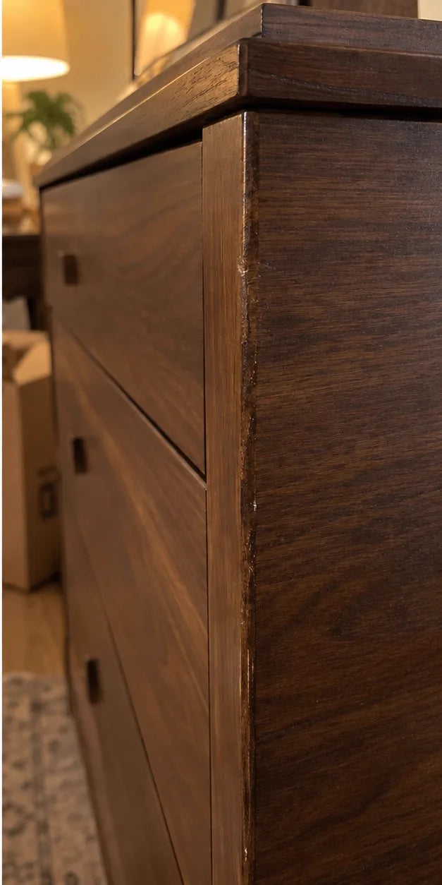 Same dresser corner after ScratchZero repair, gouge blended