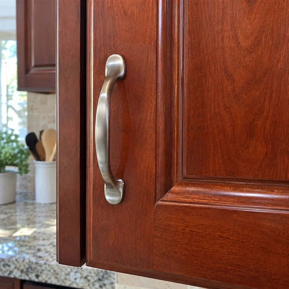 Repaired cherry cabinet scuff by the handle